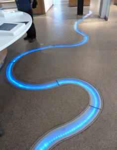 Discover Greenwich Visitor Centre - River Thames depicted in illuminated floor recess